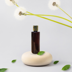 100ML AMBER CYLINDER BOTTLE WITH GOLD METALISEDISED CAP