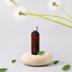 100ML AMBER ROUND BOTTLE WITH WHITE+GOLD RING CAP