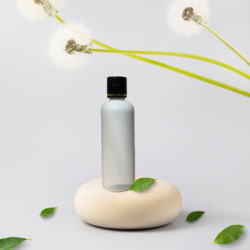 100ML WHITE ROUND BOTTLE WITH BLACK+GOLD RING CAP