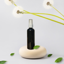 100ML BLACK ROUND BOTTLE WITH WHITE PUMP