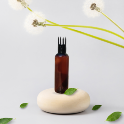 100ML AMBER ROUND BOTTLE WITH BLACK COMB