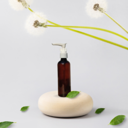 100ML AMBER ROUND BOTTLE WITH DISPENSER