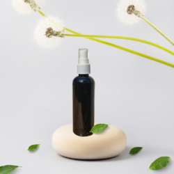 100ML BLACK ROUND BOTTLE WITH WHITE MIST