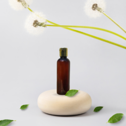 100ML AMBER ROUND BOTTLE WITH GOLD METALISEDISED CAP