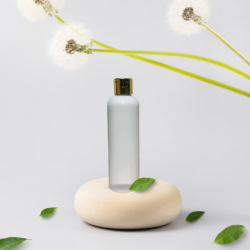 200ML WHITE ROUND BOTTLE WITH GOLD METALISEDIZED CAP