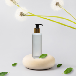 200ML WHITE CYLINDER BOTTLE WITH BLACK+GOLD SLEEVE DISPENSER